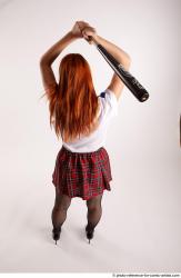 TINA STANDING POSE WITH BASEBALL BAT